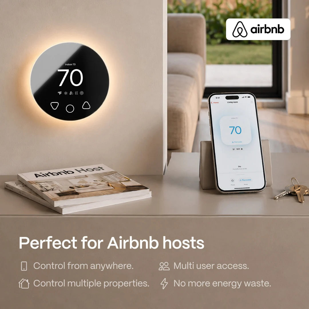 Klima smart thermostat on a wall with the phone app, made for Airbnb hosts managing multiple properties